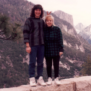 A vintage photo of Mike and a friend standing together at Yosemite