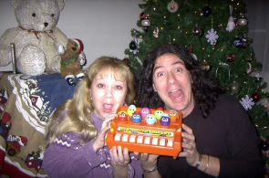 Mike and a friend goofing around at Christmas with a toy keyboard