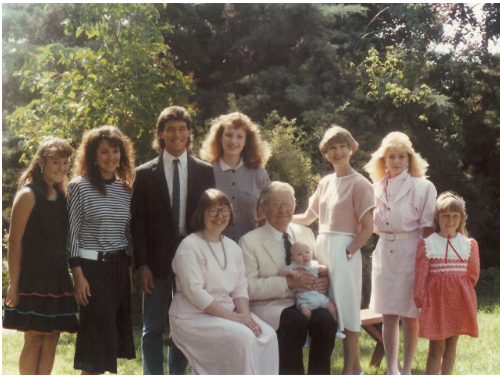 Mike with his family in a group portrait from the 1980s