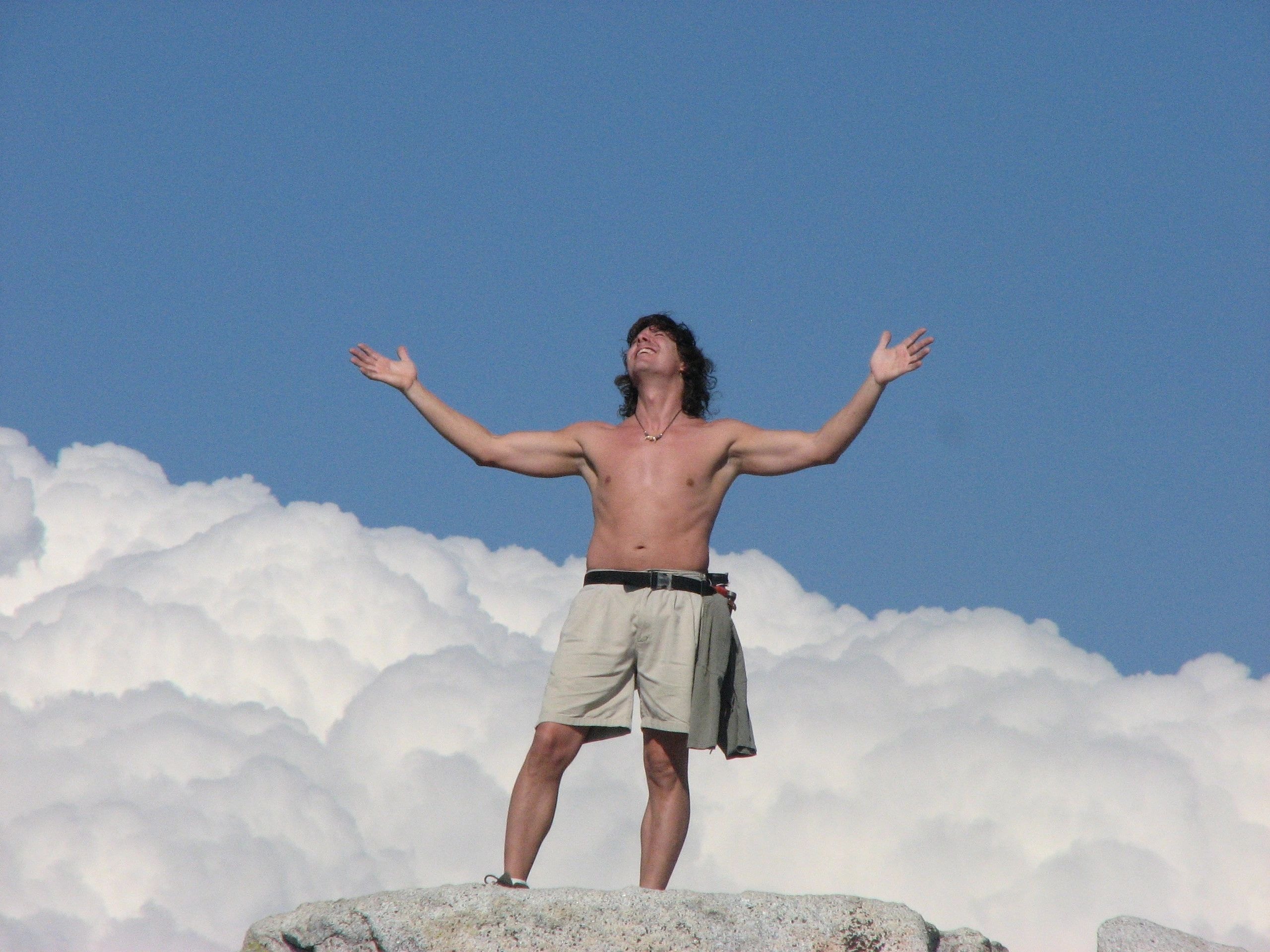 Mike at Half Dome with clouds
