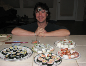 Mike with a spread of homemade sushi