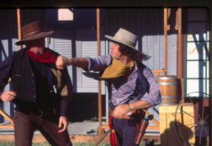 Mike performing a western stunt fight scene